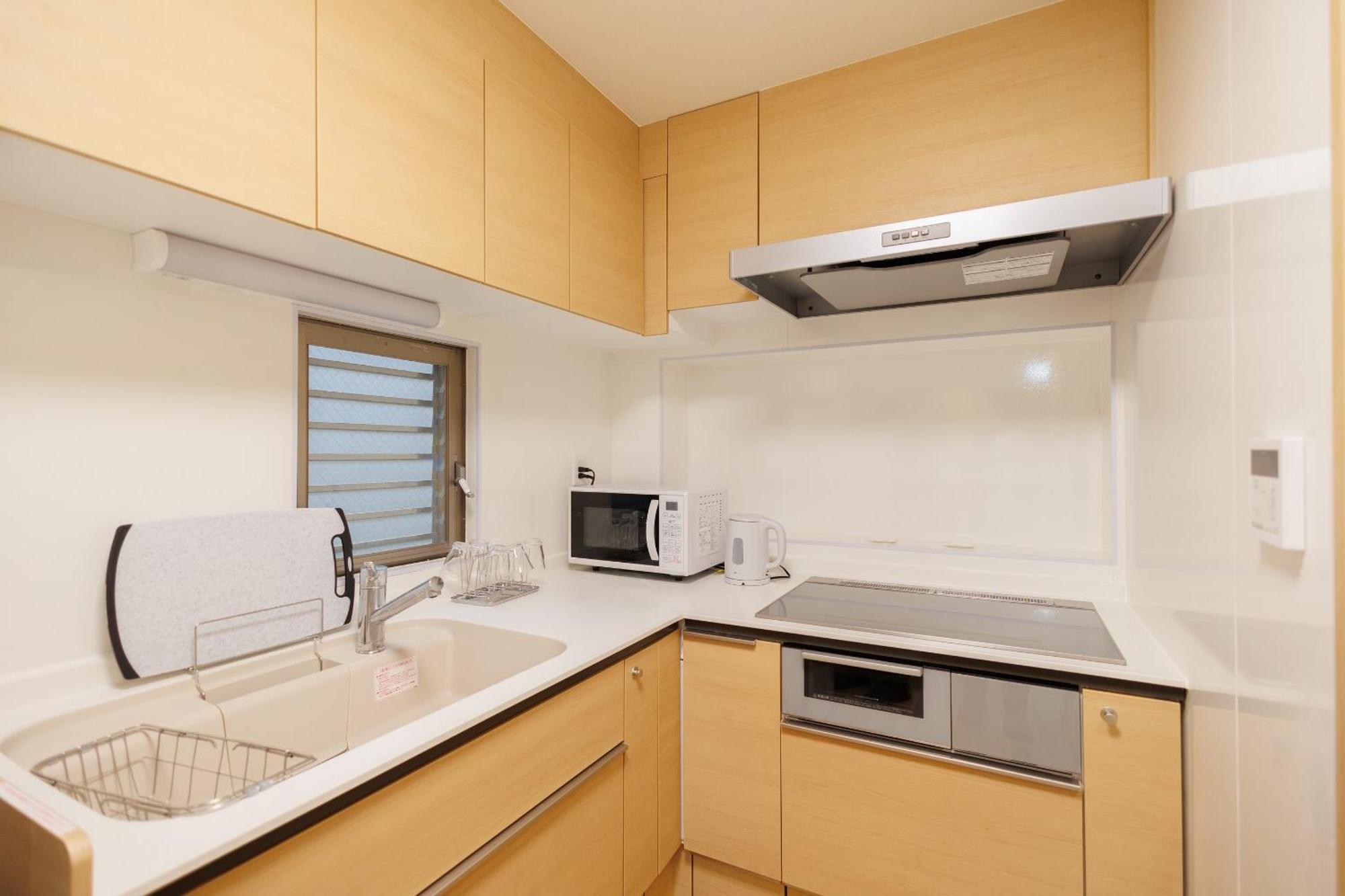Hotaku Hotel Akihabara Tokió Szoba fotó